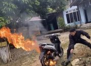 Aksi Heroik Personel Polres Morut Padamkan Motor Pelajar yang Terbakar